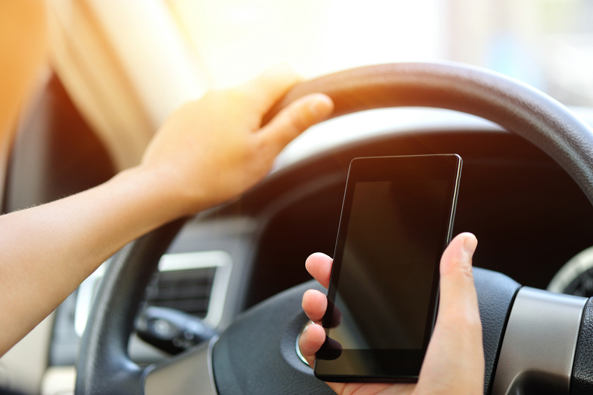 Driving with cell phone.jpg Driving with cell phone.jpg