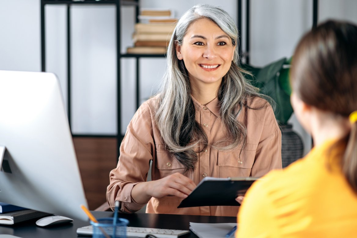 woman interviewing a job candidate