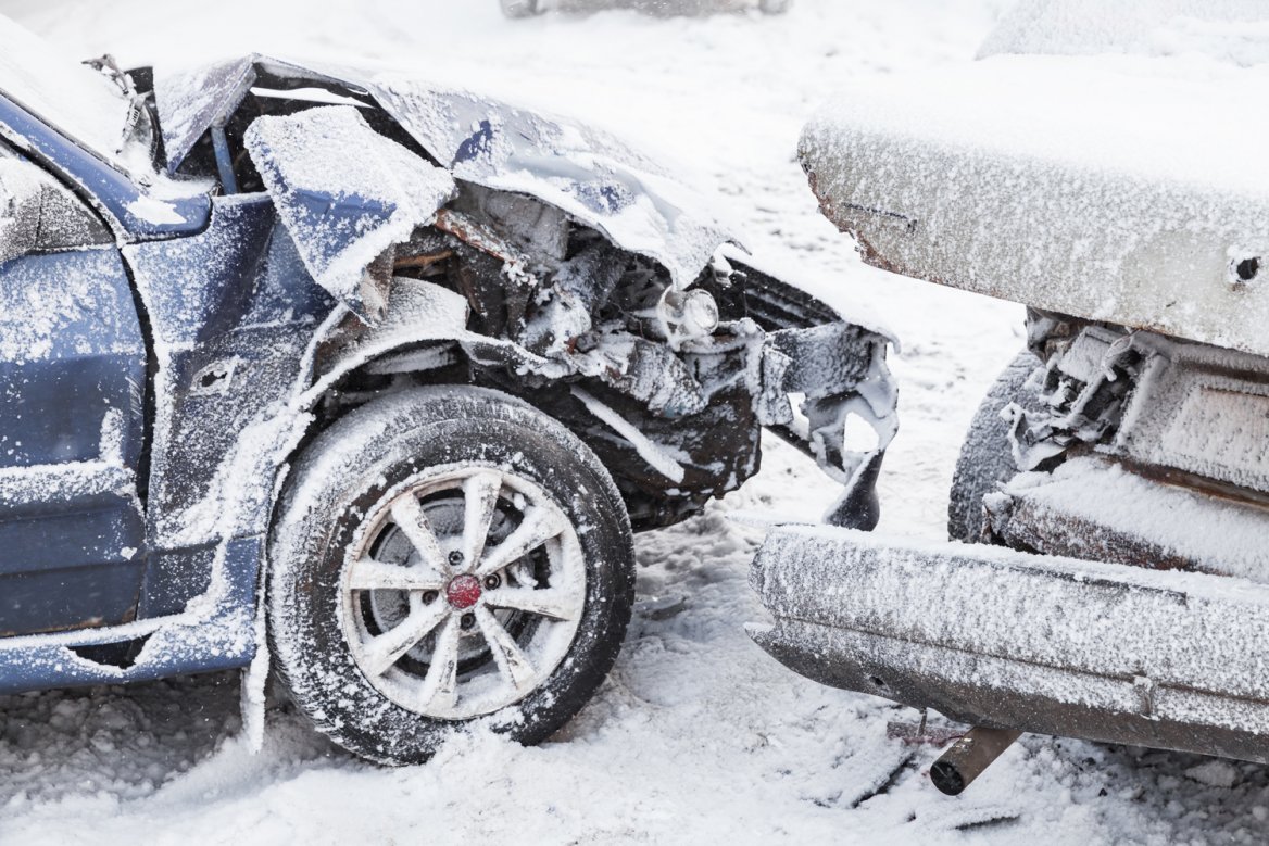 crashed cars in snowy weather