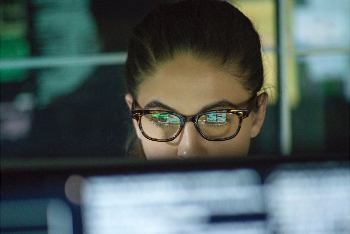 woman looking at computer